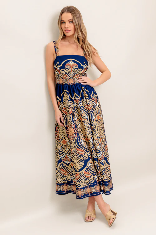 A lightweight, breathable woven midi dress perfect for warm days, 'Sahara Dreams Woven Midi Dress'